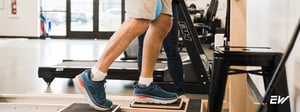Patient performing lower extremity strengthening and balance training to improve leg stability and functional mobility.