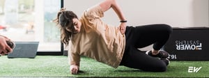 Person performing rehabilitation exercise targeting hip and thigh muscles affected by IT band syndrome.