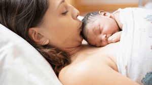 A mother with her newborn on her chest