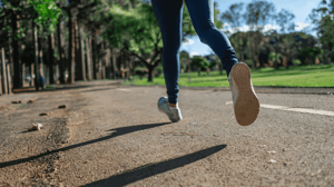 Feet running on an outdoor path