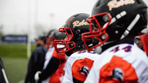 Football players lined up on the field.
