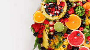 A colorful plate of fruit on a white background.